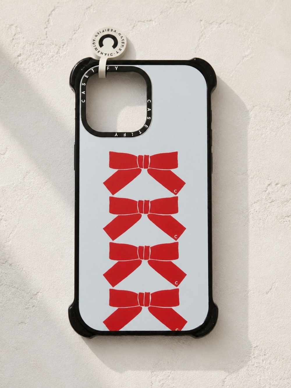 Casetify Red Bow Pattern iPhone Case with Black Frame